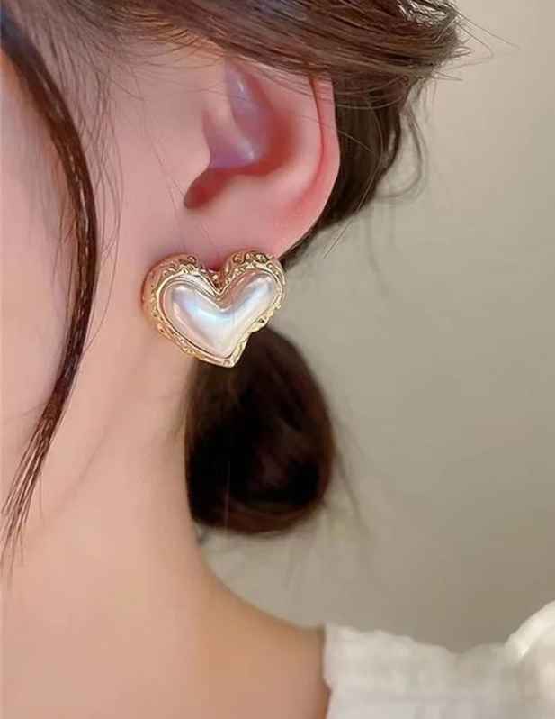 Heart Shaped Pearl Earrings buy now