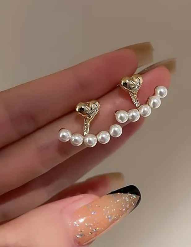 gold earrings heart design